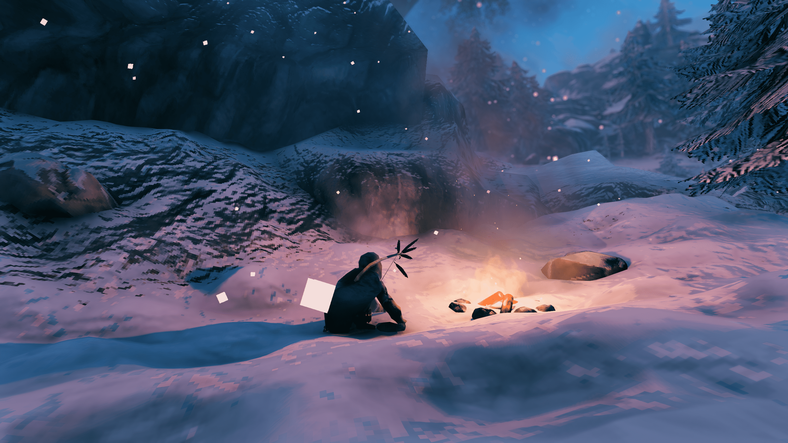 Valheim-personage rust bij een kampvuur in de sneeuw