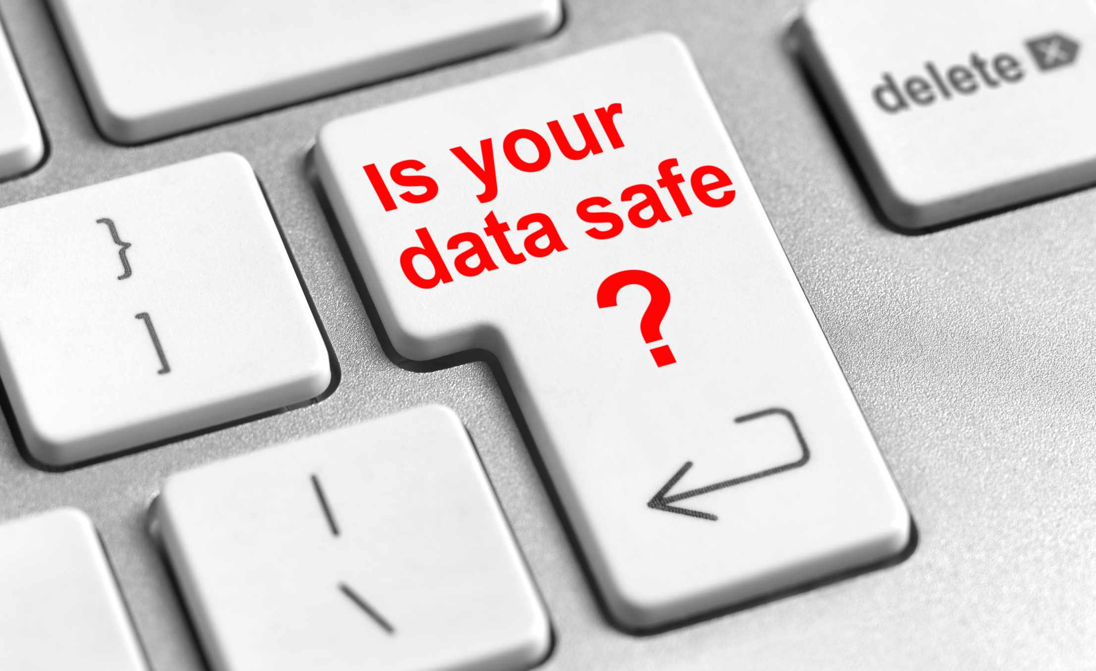 Een toets op een toetsenbord met de vraag "Is uw gegevens veilig" erop gedrukt in rode letters.
