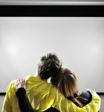 couple looking at projector screen GettyImages 157503674 5c22baa646e0fb00017b68b9