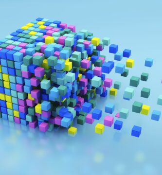 small multicolored blocks assembling in large cube shape on blue background 158318217 5ba2078446e0fb00503233da