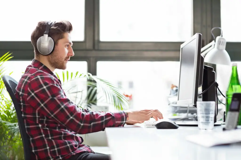 young computer programmer at a startup company 469565206 59b83bf9c412440010b644e6