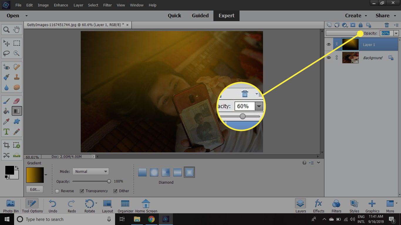 Een schermafbeelding van Photoshop Elements met de schuifregelaar voor dekking gemarkeerd