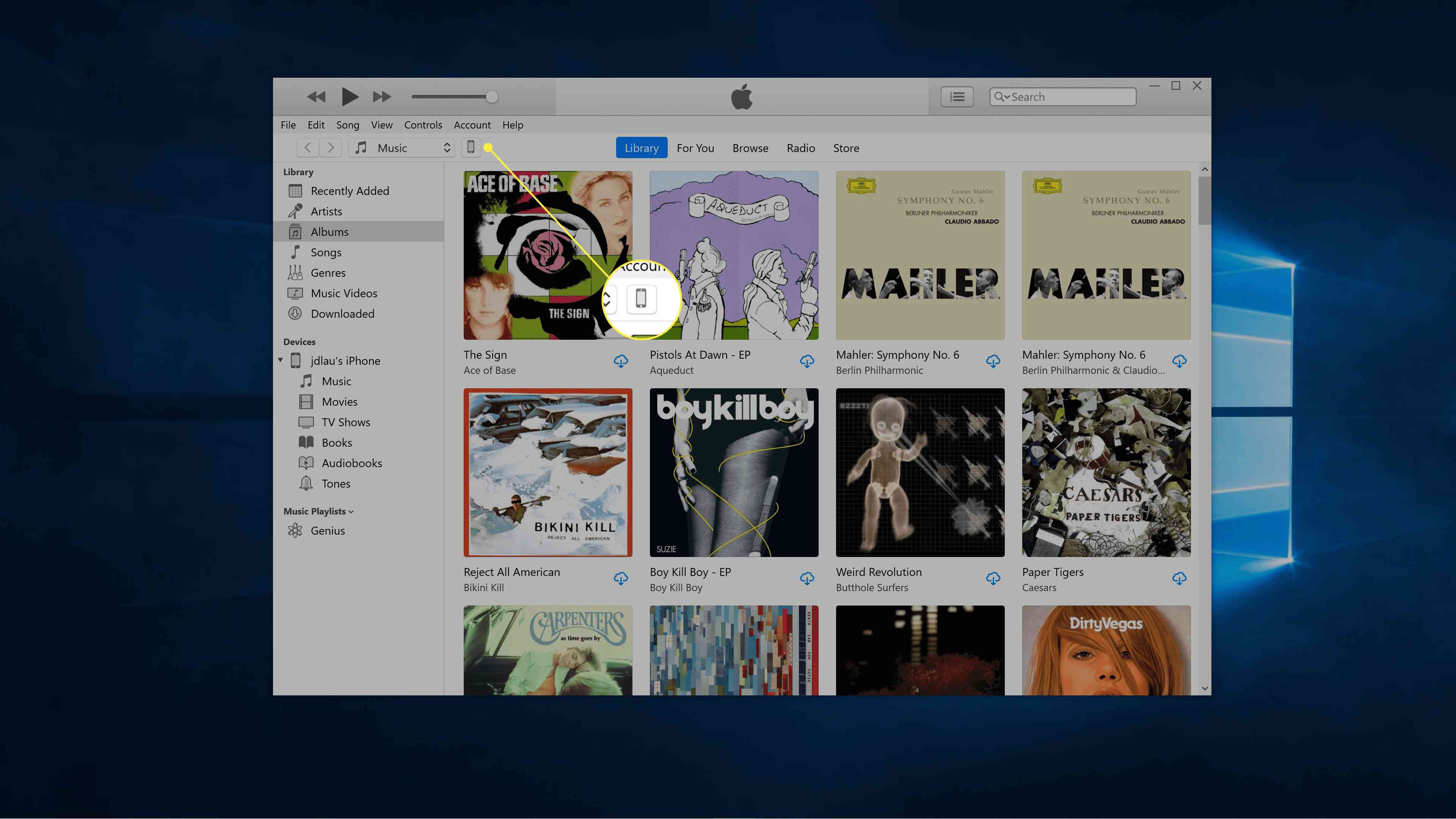 Het iPhone-pictogram rechts van Muziek gemarkeerd in iTunes.