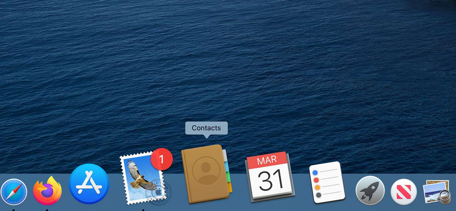 Het Dock met het pictogram van de app Contacten