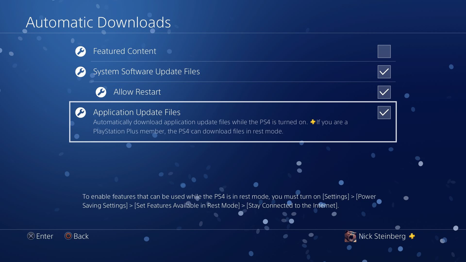 Applicatie-updatebestanden selecteren onder Instellingen voor automatische downloads van PS4.