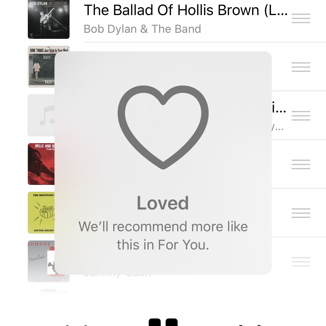 Screenshot van de Muziek-app met een geliefd nummer