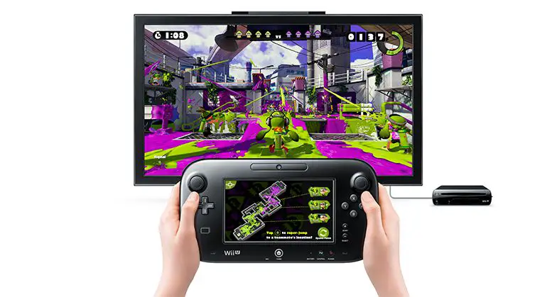 Een kleurrijke scène uit Nintendo's Wii U-spel Splatoon met controller in handen