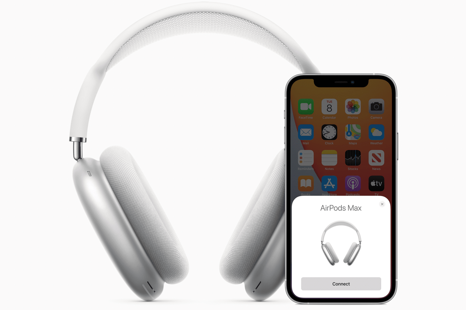 AirPods Max in het wit naast een eraan gekoppelde iPhone