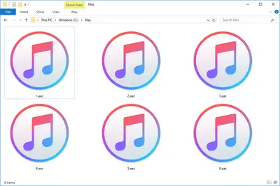 Screenshot van verschillende AAC-bestanden in Windows 10 die openen met iTunes