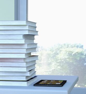 e reader and stack of book lying on a table in front of a window 3d rendering 522936559 579180c75f9b58cdf330e41d 5c76d95e46e0fb0001d83c81