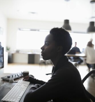 female photo editor reviewing digital photo proofs on computer in office 928149450 5b74907246e0fb00503de38f