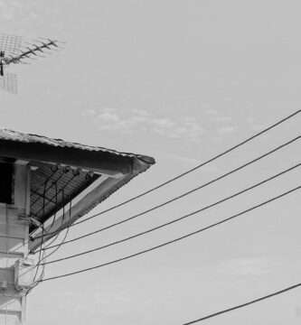 low angle view of cables on building against sky 670945507 57f17c003df78c690fe9b7a9