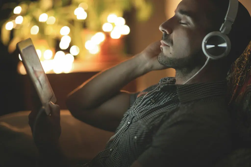 relaxed man listening to music at home at night 465863031 57a211d33df78c3276d69518