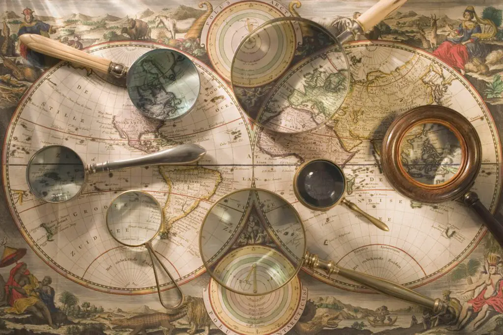 still life of old map with magnifying glasses 79251200 5b5135b0c9e77c005b2ba74c