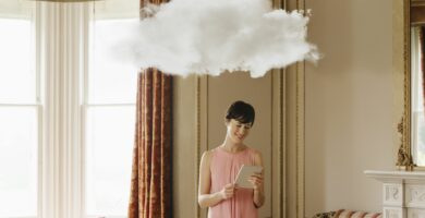 woman in living room with cloud above head 186666641 5b31276f0e23d900369687db