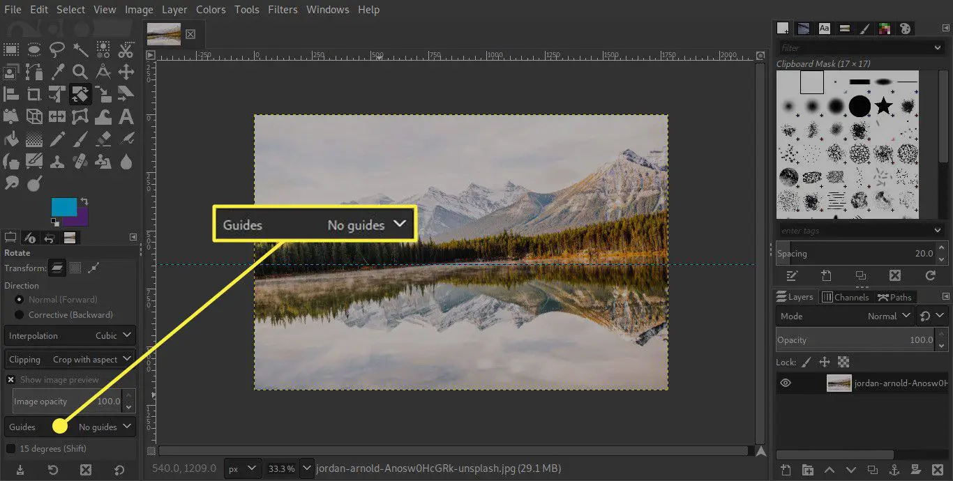 Een screenshot van GIMP met de optie Gidsen in het gereedschap Roteren gemarkeerd