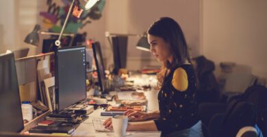 side view of a young woman working on a computer 471104740 57e98c8c3df78c690f868336