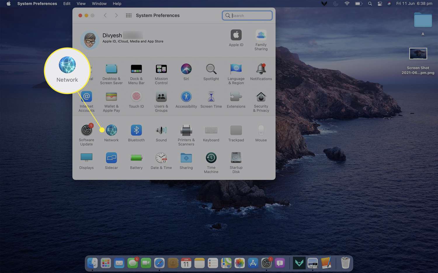 Mac-bureaublad met venster Systeemvoorkeuren geopend en Netwerk gemarkeerd